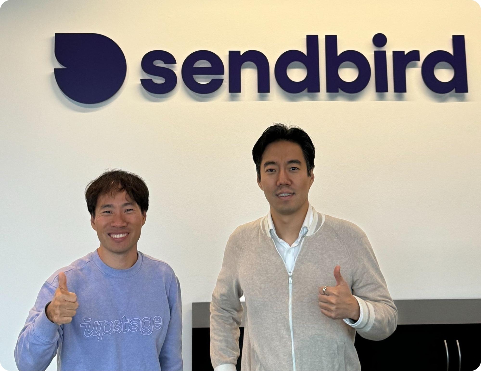 Upstage CEO Sung Kim pictured with Sendbird CEO and Co-founder John Kim.